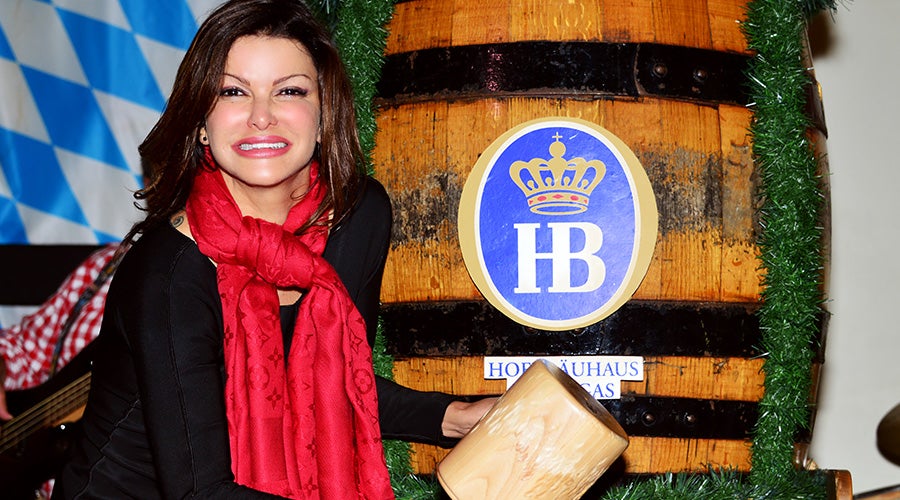 Celebrity chef Carla Pellegrino taps the keg at hofbrauhaus las vegas