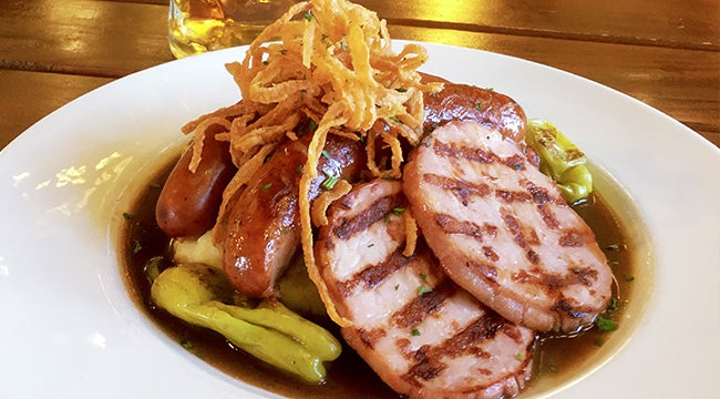 The Hofbrauhaus Smokehouse Platter is the perfect dish for meat lovers